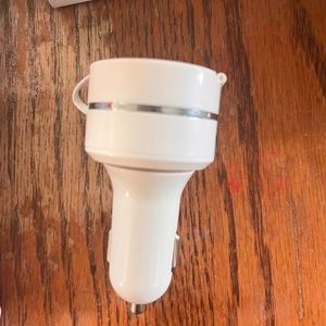 iPhone,andriod charger for car with built in cable brand new, never been used